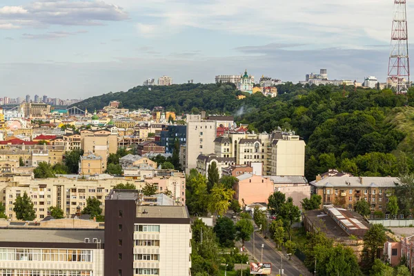 Kyiv, Ukraine  July 08, 2017: A beautiful panorama of Podil area. Aerial view on residential and industrial areas. A lot of buildings of different architectural style. Historical area, Dnipro river.