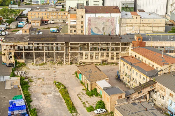 Kyiv, Ukraine  July 08, 2017: A beautiful panorama of Podil area. Aerial view on residential and industrial areas. A lot of buildings of different architectural style. Historical area, Dnipro river.