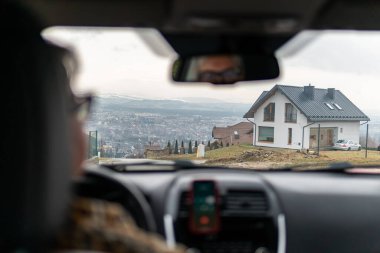 Nice view from a car on city and mountains. Travel destination. 