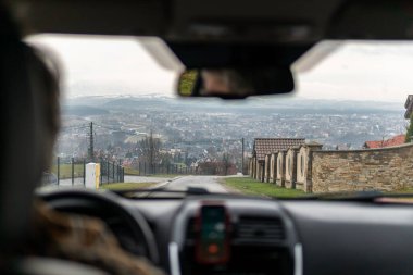 Nice view from a car on city and mountains. Travel destination. 