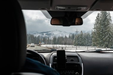 Nice view from a car on city and mountains. Travel destination. 
