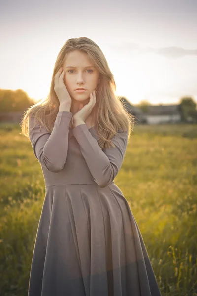 Young beautiful girl outdoor portrait in pastel tones — Stock Photo, Image
