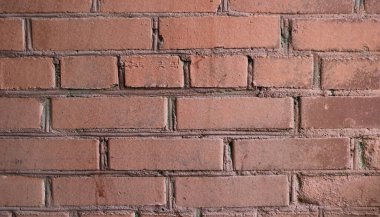 Soluk kırmızı tuğla duvarın Grunge dokusu