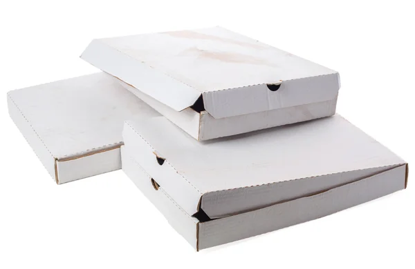 Schmutzige leere Schachteln auf weißem Hintergrund — Stockfoto