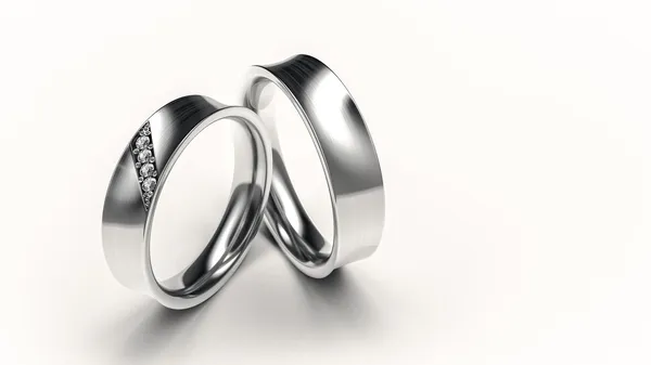 Pair of silver rings with small diamonds for lovers — Stock Photo, Image