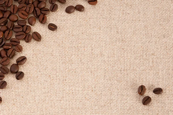 Coffee beans on canvas — Stock Photo, Image