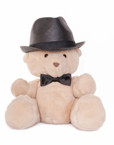 Portrait of teddy bear with bow tie and hat — Stock Photo, Image