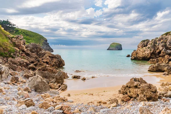 Troenzo beach, in the town of Celorio, a beach that becomes a small cove with the rising tide, Llanes.