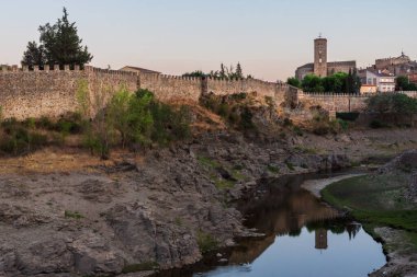 Exterior of the walled enclosure of Buitrago de Lozoya, with the church of Santa Maria del Castillo standing out between the walls.Madrid