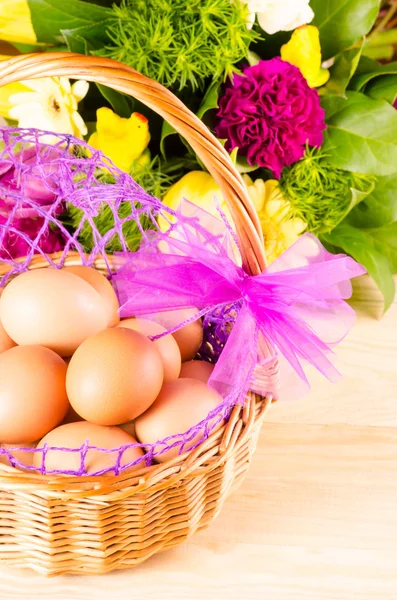 Easter decorative eggs in the basket — Stock Photo, Image