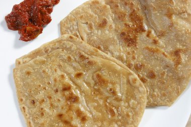 Hindistan kökenli bir gözleme paratha (veya güçlendirici) olduğunu