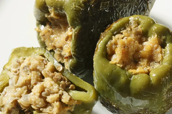 Lentil Stuffed Peppers - Stuffing green bell peppers — Stock Photo, Image