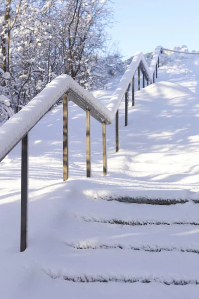 Winter stair covered in Snow
