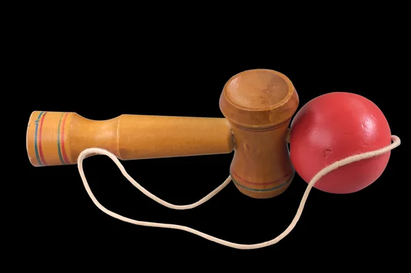 Kendama isoliert auf schwarz — Stockfoto