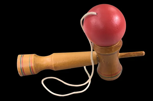 Kendama isoliert auf schwarz — Stockfoto