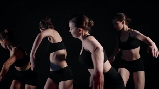 Contemporary dance improvisation, four women are rehearsing together in studio — Stock Video