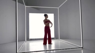 modern dance style, woman is dancing, improvisation in rehearsing, contemporary movements