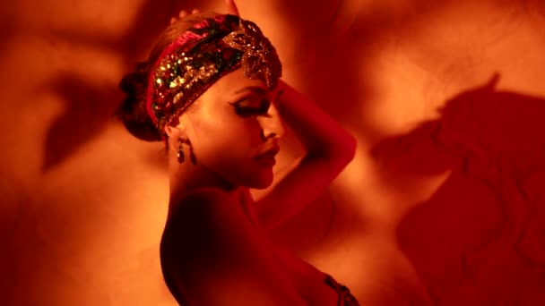 Stunning arabian queen is dancing traditional seductive dance, sexy lady in oriental gown for dance — Stock Video