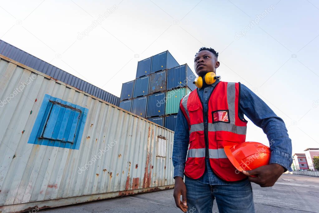 Black male African American engineering in uniform holding