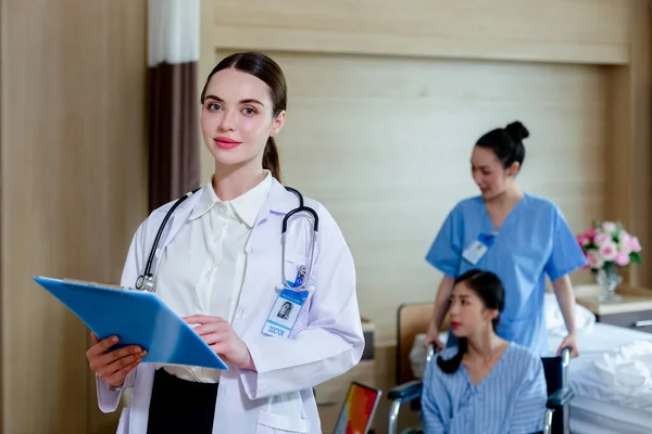 Portrait Doctor Woman Hanging Stethoscope Holding Clipboard Paper Checklist Standing — Stok fotoğraf