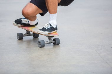 man playing skateboard on street city. skateboarding outdoor sports. extreme sports concept.