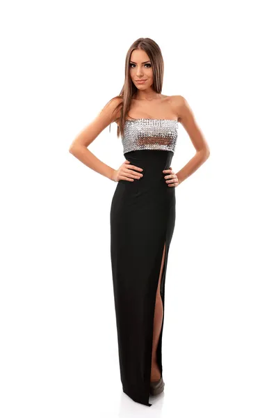 Full length studio portrait of an attractive young woman wearing an elegant evening gown — Stock Photo, Image