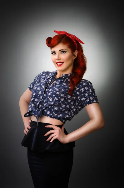 Pin up girl posing with hands on hips — Stock Photo, Image