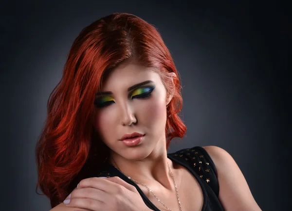 Close up van een vrouw met creatieve kleurrijke make up Rechtenvrije Stockafbeeldingen