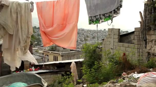 Laundry hanging over Port au Prince, Haiti. — Stock Video