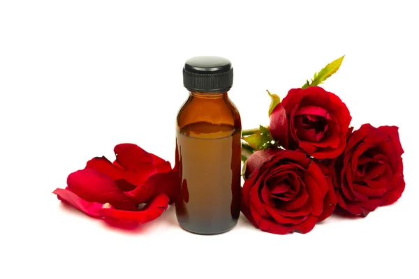 Рожева Олія Скляній Пляшці Червоною Квіткою Троянд Ізольована Білому Тлі — стокове фото