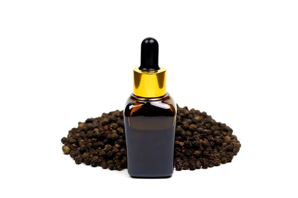 Black Pepper Essential Oil Glass Bottle Pile Peppercorn Isolated White — Stock Photo, Image