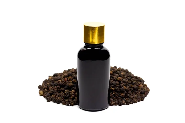 Black Pepper Essential Oil Glass Bottle Pile Peppercorn Isolated White — Stock Photo, Image