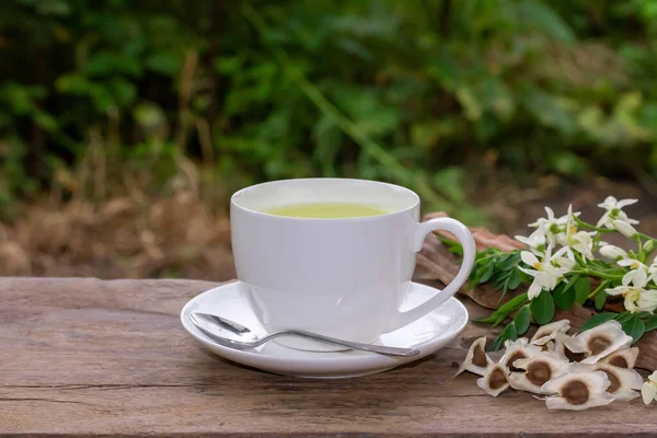 Moringa Tea White Cup Fresh Green Leaf Flower Pod Seeds — стоковое фото