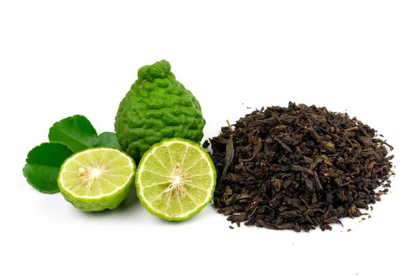 Bergamot tea or Earl Grey tea and fresh bergamot fruit isolated on white background.