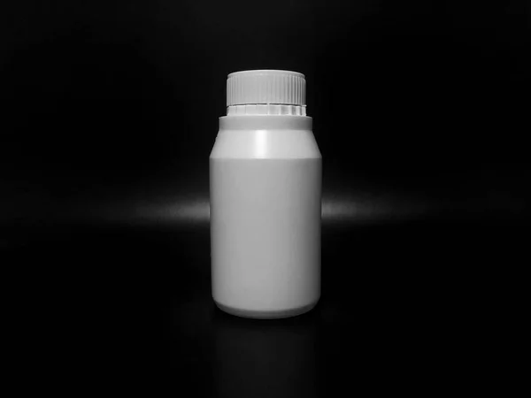 Empty Plastic White Bottle Dark Background — Stock Fotó