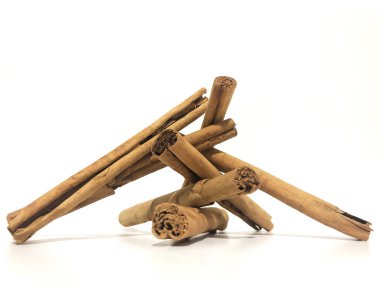 Fragrant cinnamon sticks on a white background
