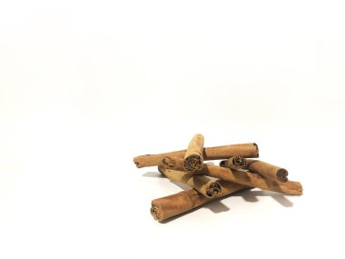Fragrant cinnamon sticks on a white background