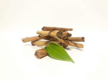 Fragrant cinnamon sticks on a white background