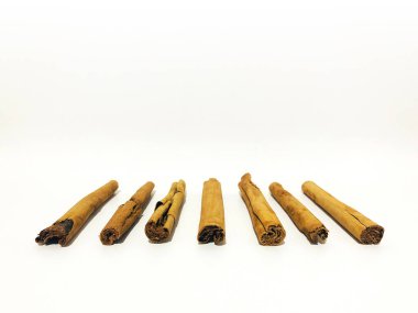 Fragrant cinnamon sticks on a white background