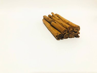 Fragrant cinnamon sticks on a white background