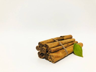 Fragrant cinnamon sticks on a white background