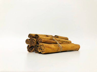 Fragrant cinnamon sticks on a white background