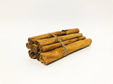 Fragrant cinnamon sticks on a white background