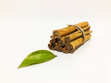 Fragrant cinnamon sticks on a white background