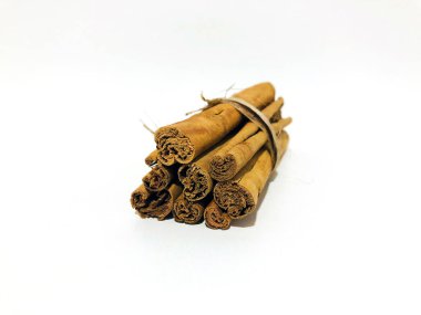 Fragrant cinnamon sticks on a white background