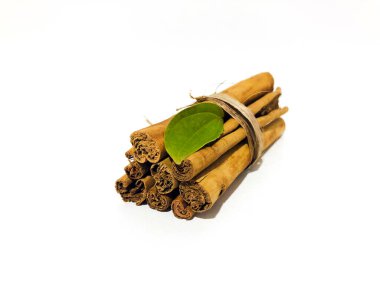 Fragrant cinnamon sticks on a white background