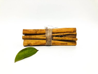 Fragrant cinnamon sticks on a white background