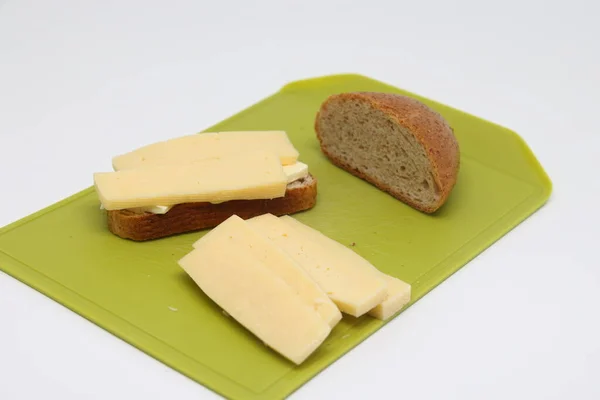 Sandwich Cheese Butter Bread Bran Sliced Lobes Cutting Board — Stockfoto