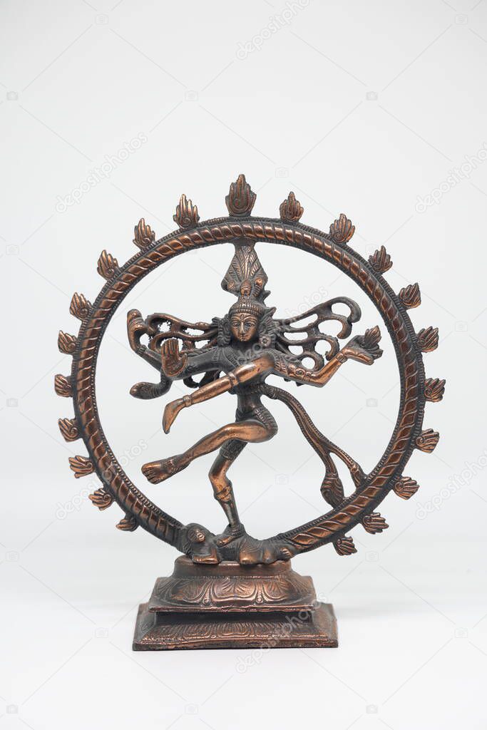 Shiva Nataraja figurine bronze isolated close up on white background.