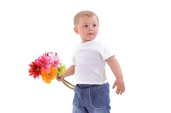 Маленький мальчик с цветами — стоковое фото